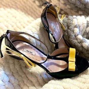 Miu Miu size 9 like new - worn once classy straps black patent with yellow bow